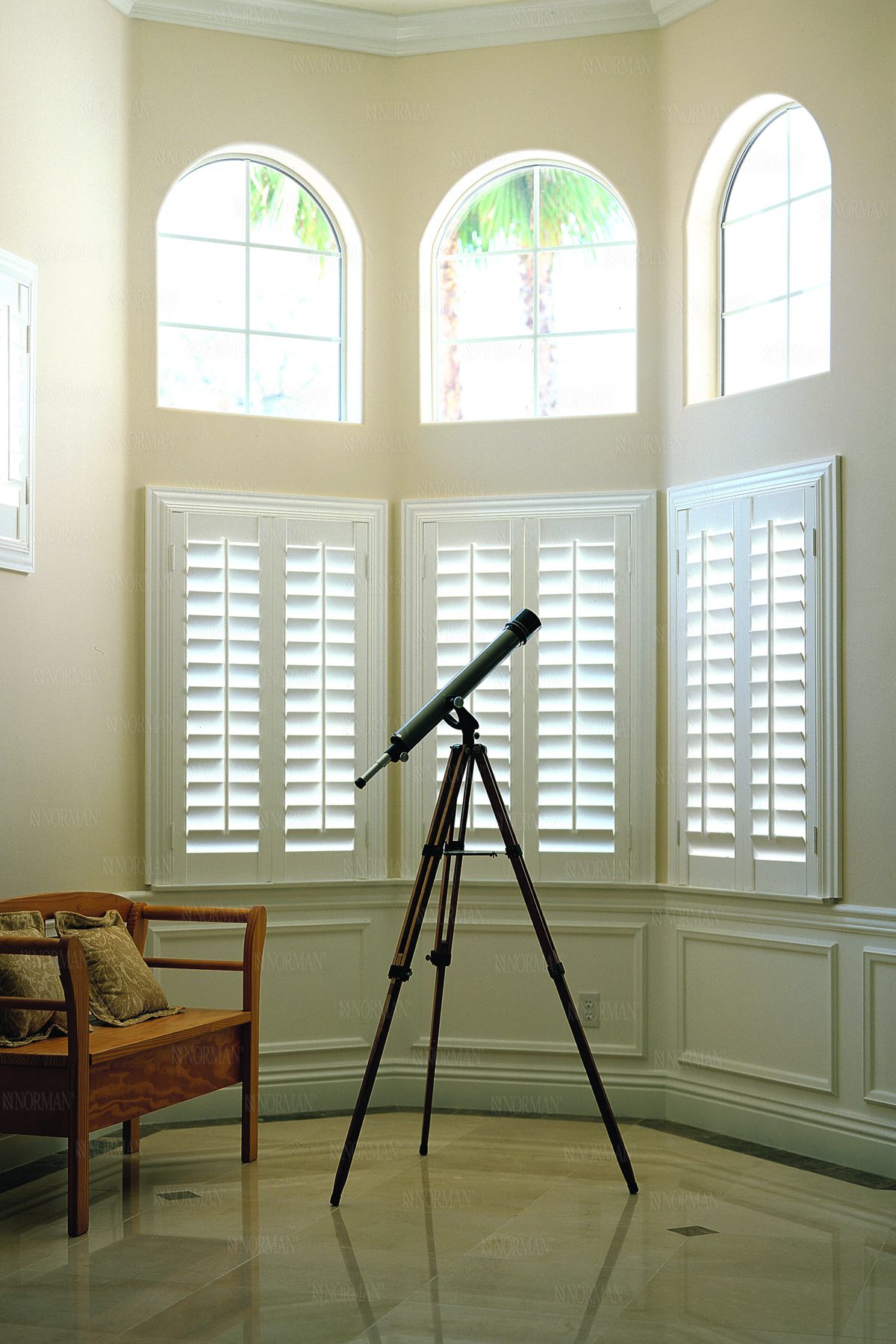 Louvered Arch Woodlore Plus™ Shutters with Invisible Tilt Louvers