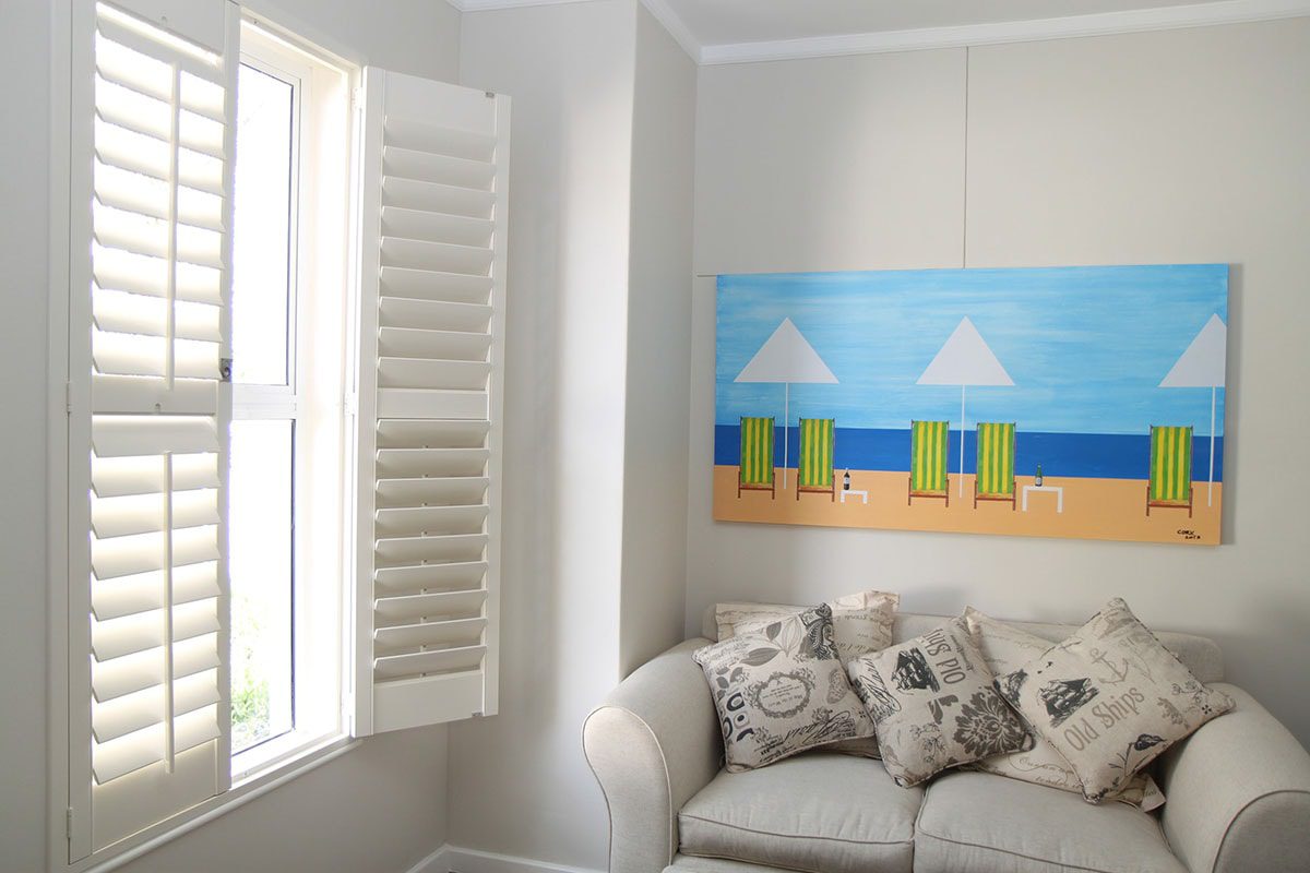 Woodlore™ Composite Wood Shutters in Family Room