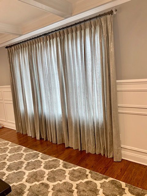 Metallic Pinch Pleat Drapes in Dining Room
