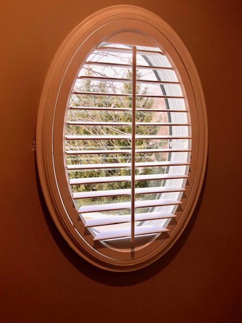 Norman Window Fashions Woodlore Plus Oval Composite Shutter in Powder Room
