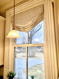 Shaped Bottom Roman Shade with Checked Fabric in Kitchen
