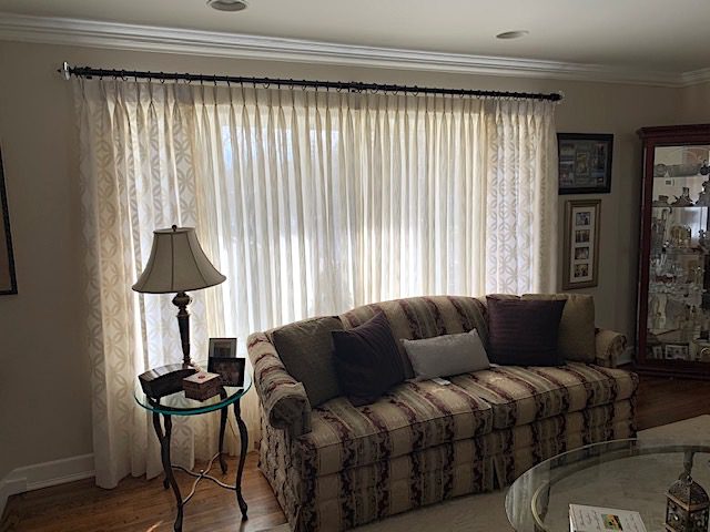 Drapery Sheers & Pinch Pleat Panels on a TRAX Rod with Crystal Finials