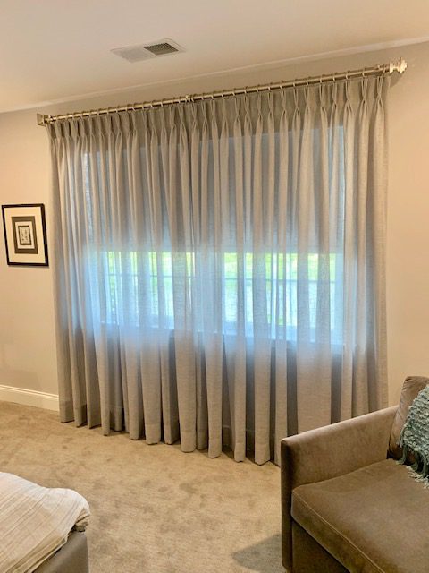 Sheer Gray Linen Pinch Pleat Drapes in Guest Room