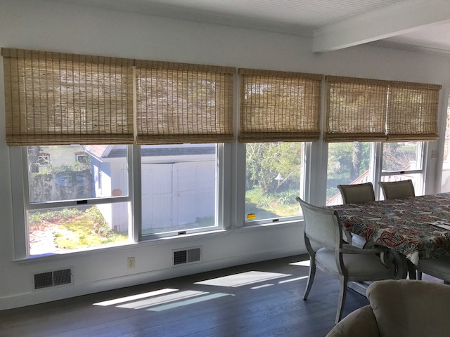 Hunter Douglas Provenance Woven Wood Shades with LiteRise Cordless Operating System in Family Room