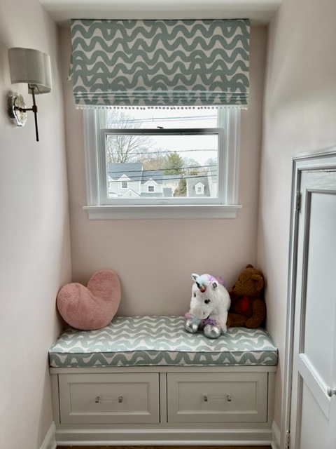 Flat Roman Valance with Pom Pom Trim and Matching Window Seat Cushion in Girl’s Bedroom
