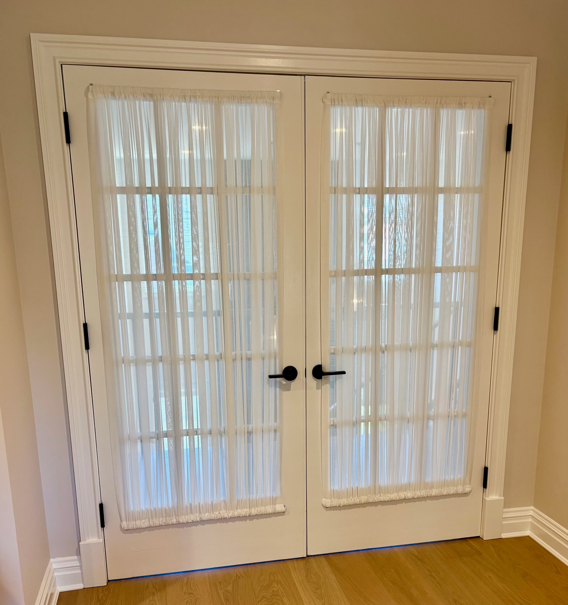Rod Pocket Sheer Stretch Panels on French Doors in Family Room