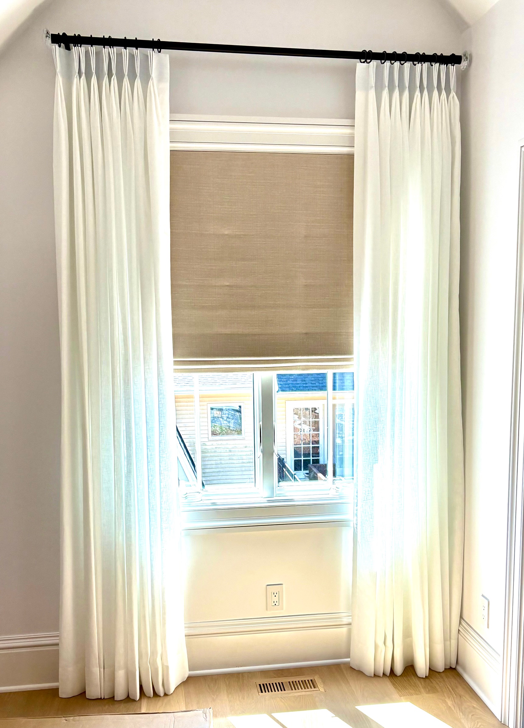 Room Darkening Flat Roman Shade with Sheer Drapery Side Panels on TRAX Hardware in Master Bedroom